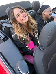 Ally Brooke sitting inside her car 