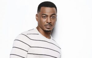 Caption: RonReaco Lee posing for photo