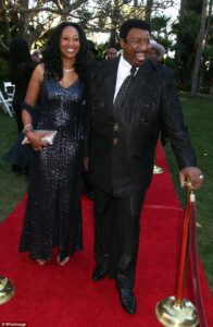 Caption: Singer Issa Pointer with her husband