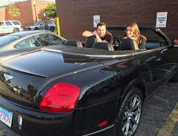 Eli Kay Oliphant inside car with his girlfriend