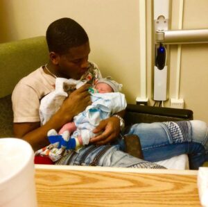 Lud Foe with his son