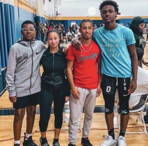 Caption: Bronny James with his friends 