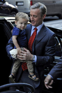 Dan Abrams outside the car with his son 