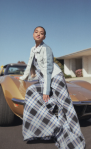 Kiersey Clemons posing for a photo with her car 