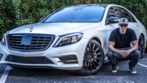 Aaron Goodwin with his car 
