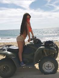 Caption: Crystal Westbrooks with her bike