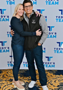 Caption: Tedy Bruschi with his wife Heidi Bomberger