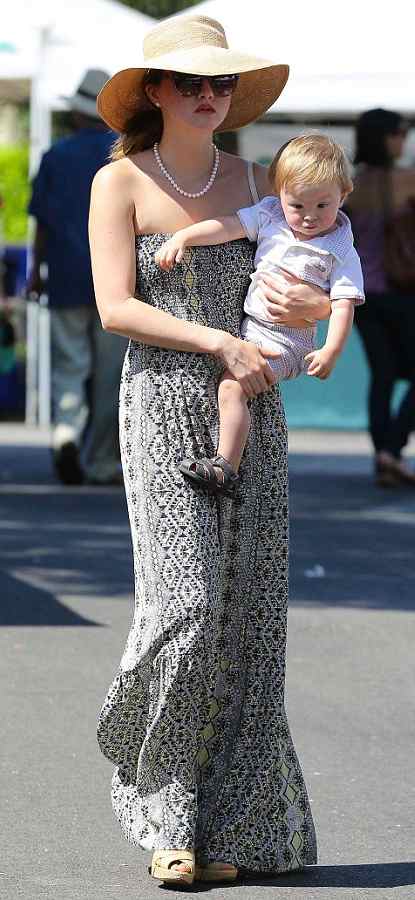 Caption: Actress Devon Aoki with her son