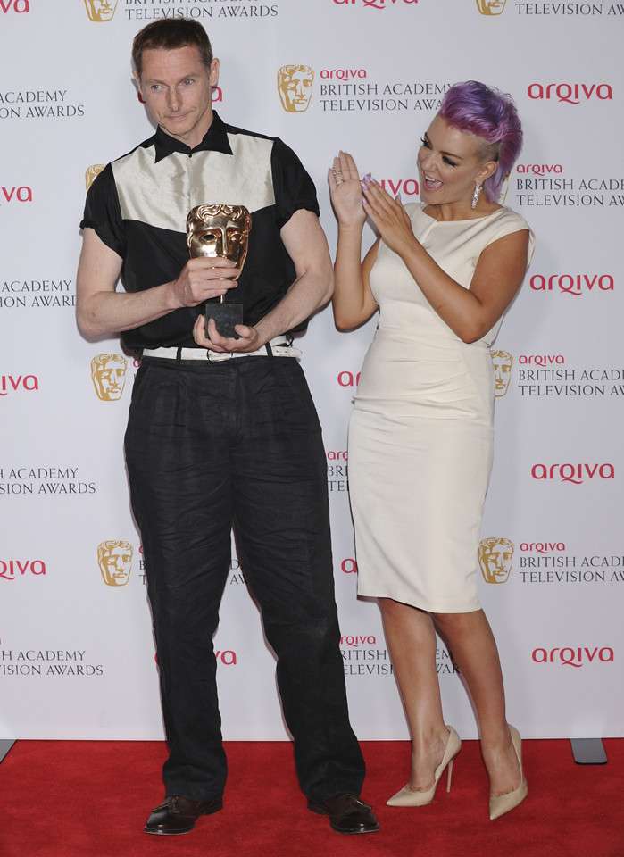 Caption: Sean Harris with her Wife