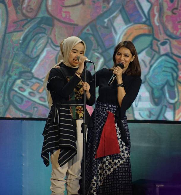 Caption: Putri Ariani, Singer and Songwriter